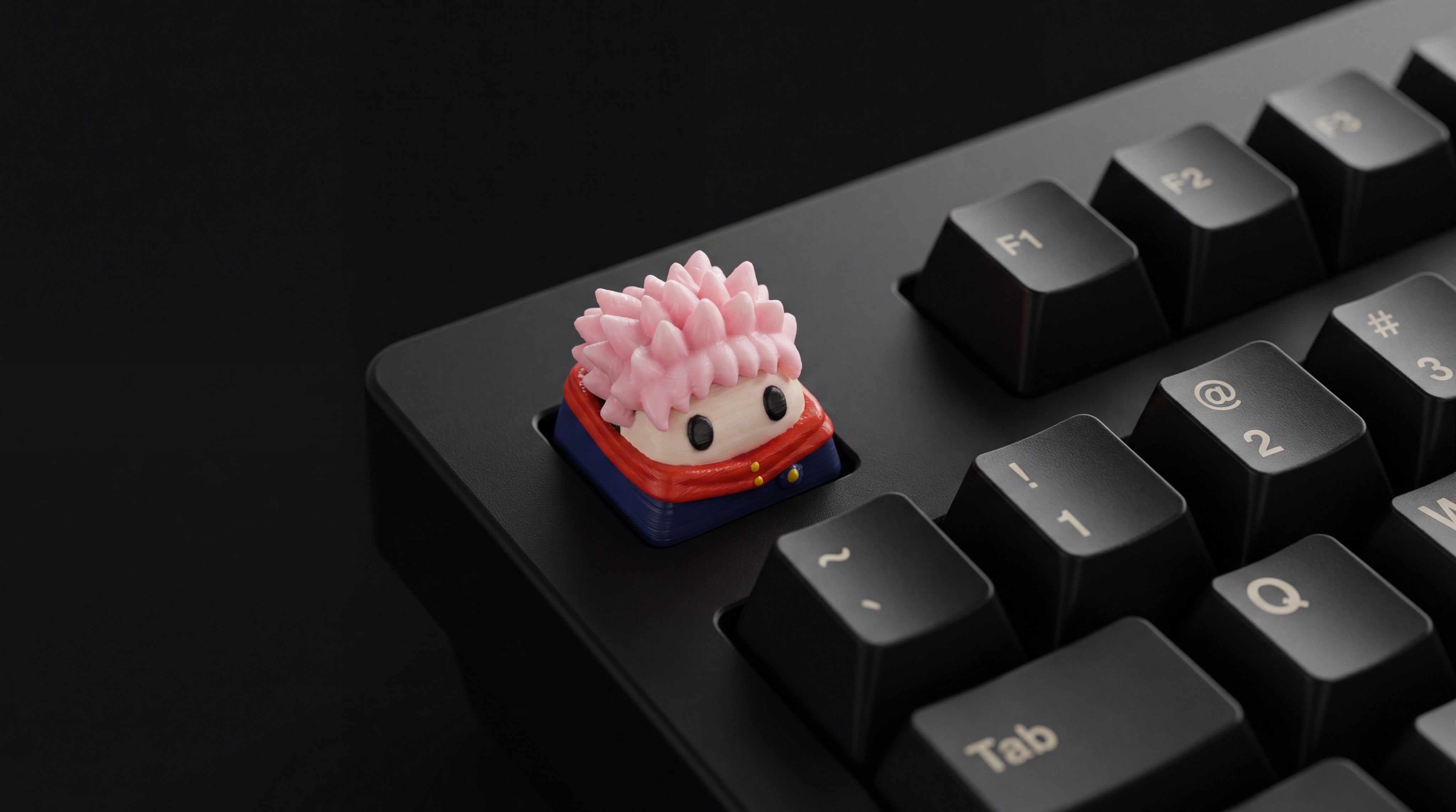 Itadori on black keyboard