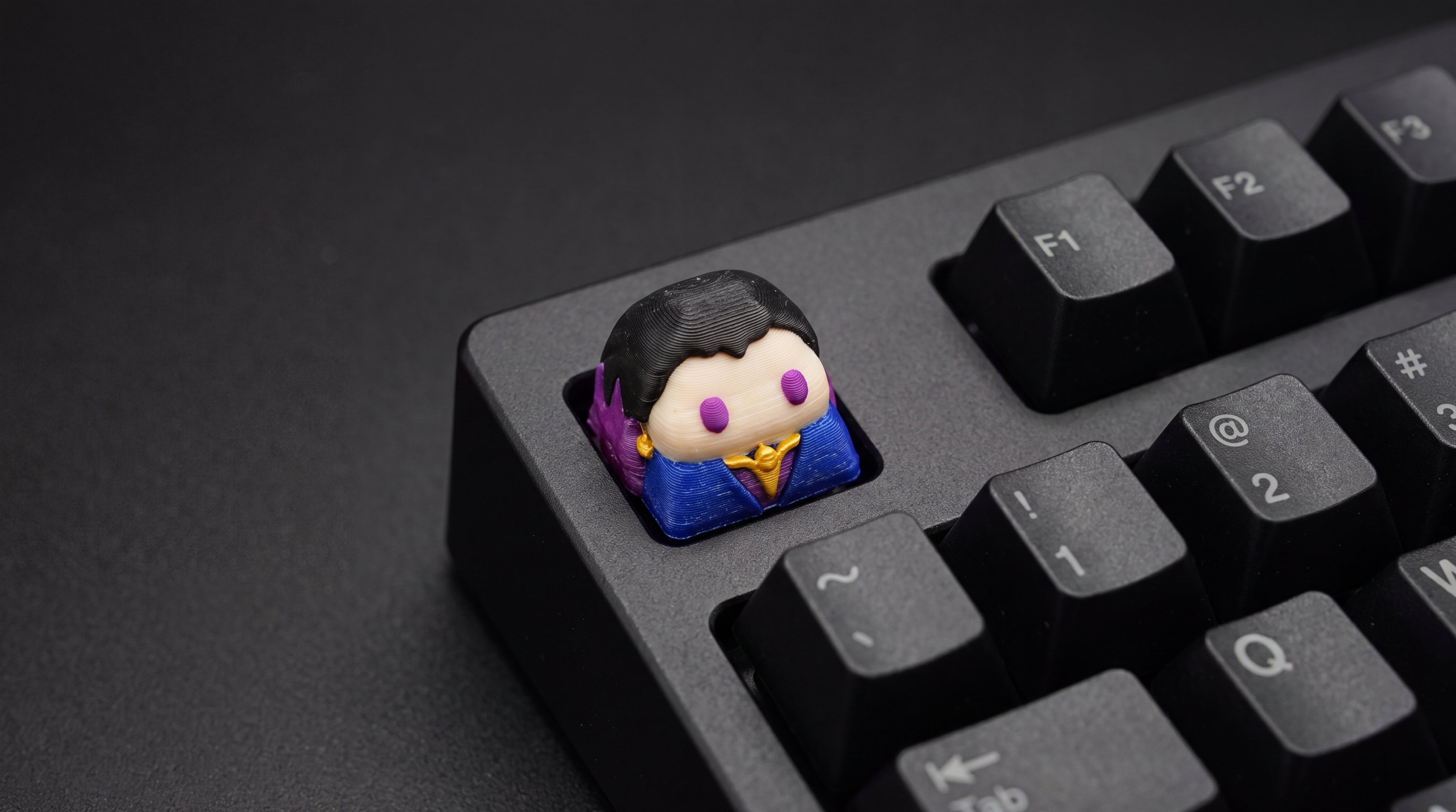 Reyna on black keyboard