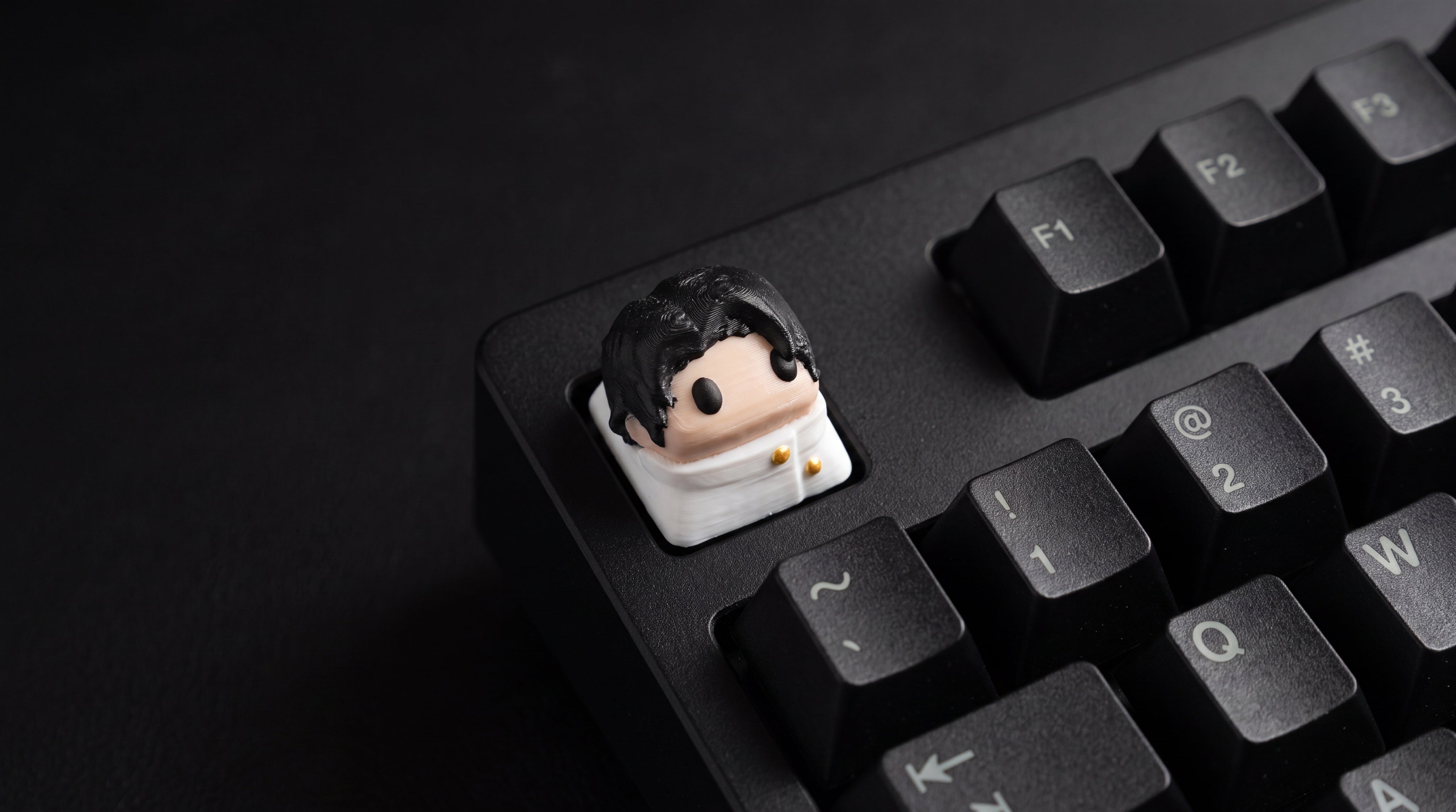 Yuta on black keyboard