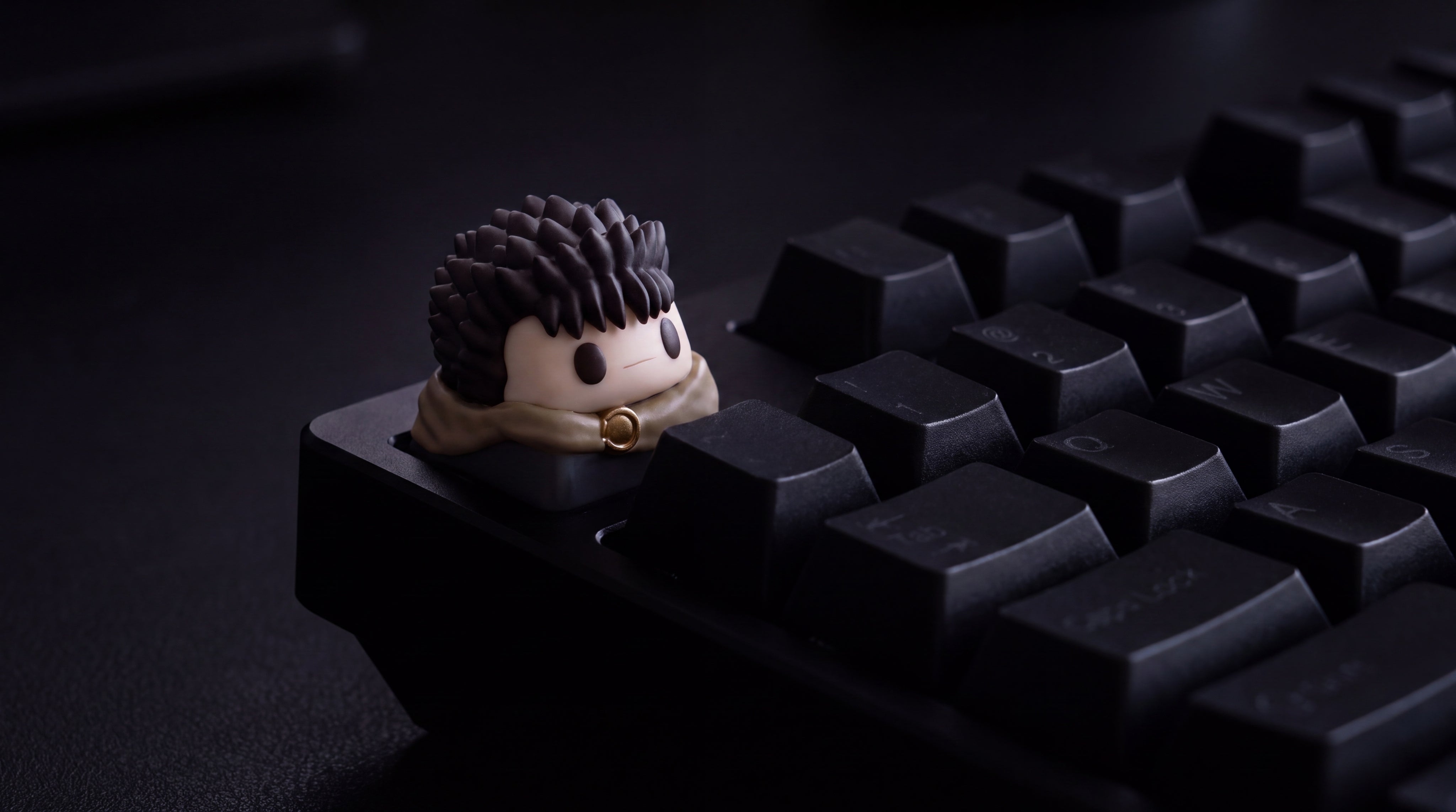 Guts Época Dorada en teclado negro