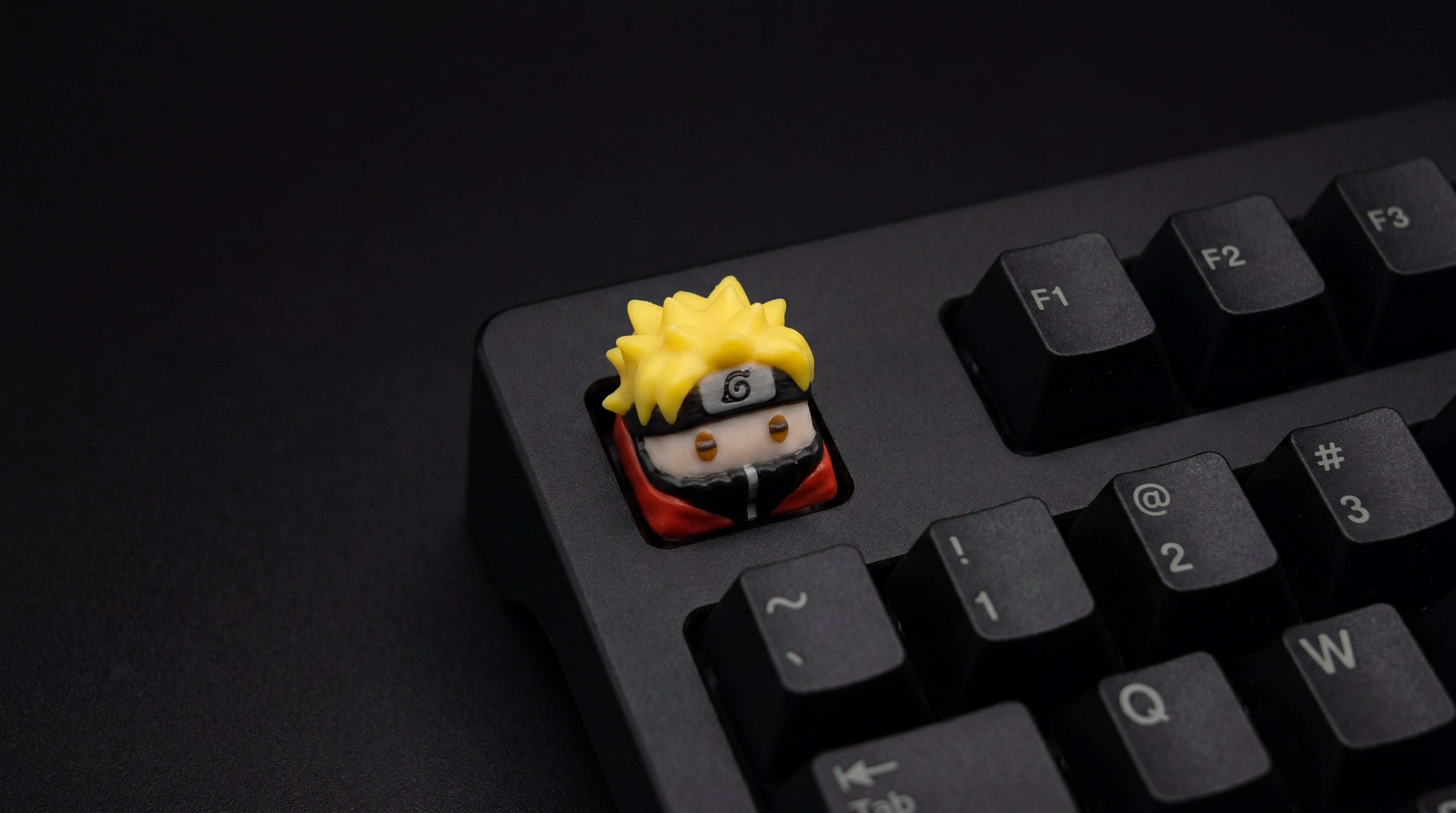 Naruto Sennin on black keyboard