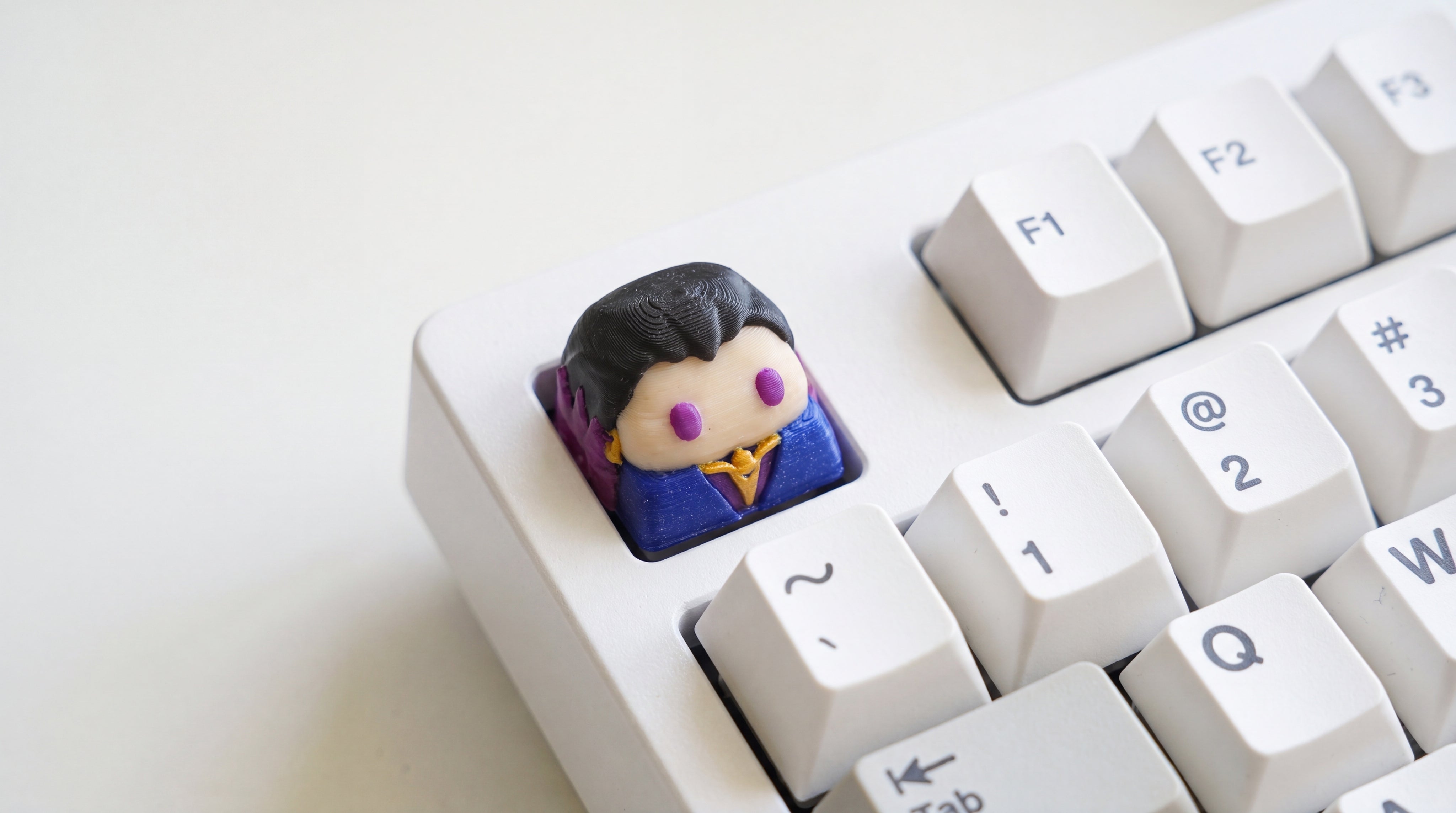 Reyna on white keyboard